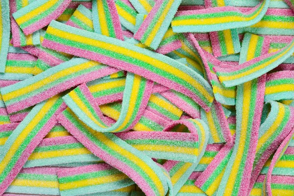 Bunte saftige Gummibärchen Hintergrund. Ansicht von oben. Geleesüße — Stockfoto