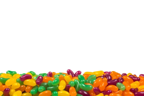Kleurrijke jelly beans geïsoleerd op wit. — Stockfoto