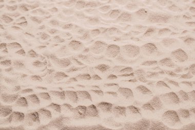 Kum dokusu yakın çekim. Kum tepesi. Üst görünüm.