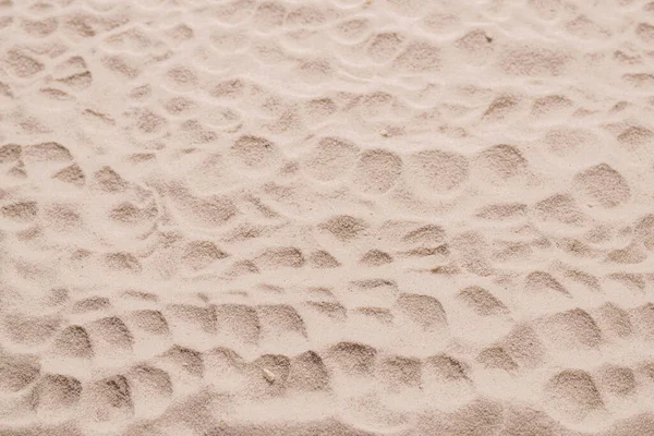 Kum dokusu yakın çekim. Kum tepesi. Üst görünüm.