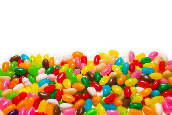 Colorful jelly beans isolated on white. Top view. 