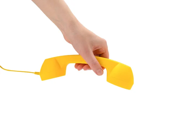 女性の手の中に黄色の携帯電話白に隔離された スペースのコピー — ストック写真