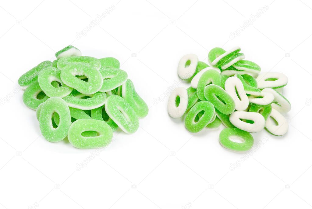 Green gummy candies rings isolated on white. Top view. Jelly  sweets.