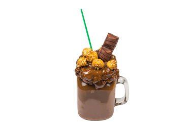 Çikolatalı milkshake, çırpılmış krema, kurabiye, waffle, cam mason kavanozunda servis edilir. 