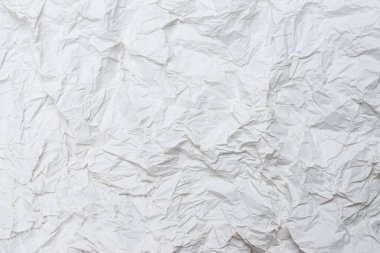 Buruşmuş beyaz kağıt arka plan. Üst görünüm. 