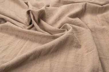 Pamuk bej kumaş desenli. Üst görünüm. 