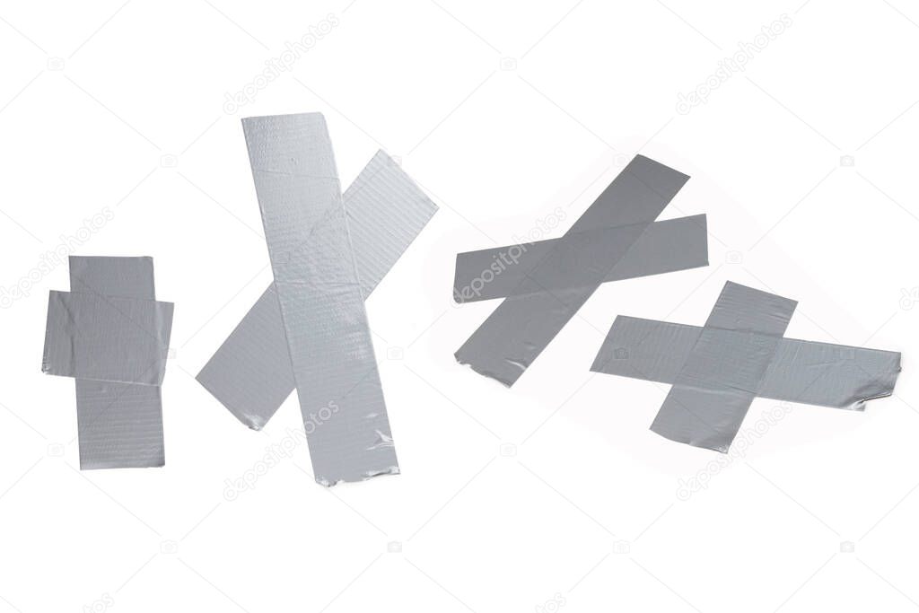 Silver scotch tape pieces isolated on white background. 