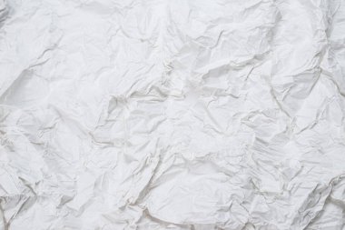 Buruşmuş beyaz kağıt arka plan. Üst görünüm. 