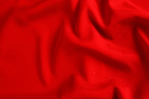 红色丝绸或缎子的奢侈面料质感可以用作抽象的背景 顶部视图 — 图库照片