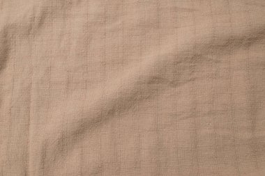 Pamuk bej kumaş desenli. Üst görünüm. 