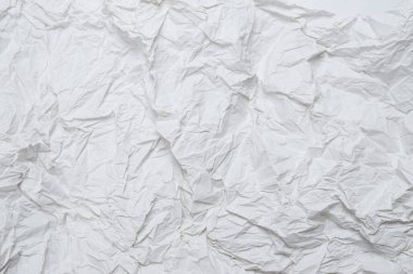 Buruşmuş beyaz kağıt arka plan. Üst görünüm. 