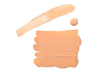 Sıvı fondöten lekesi beyaz arka planda izole edilmiş. Makyaj kremi örneğini kapat.