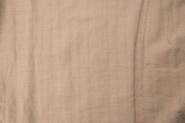 Pamuk bej kumaş desenli. Üst görünüm. 