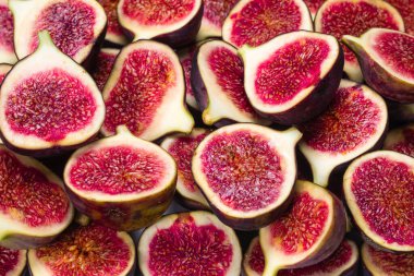 Lezzetli incir arka planı. Üst Manzara. Dilimler.  