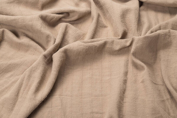 Cotton beige fabric pattern. Top view. 