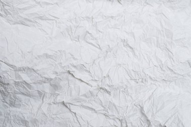 Buruşmuş beyaz kağıt arka plan. Üst görünüm. 