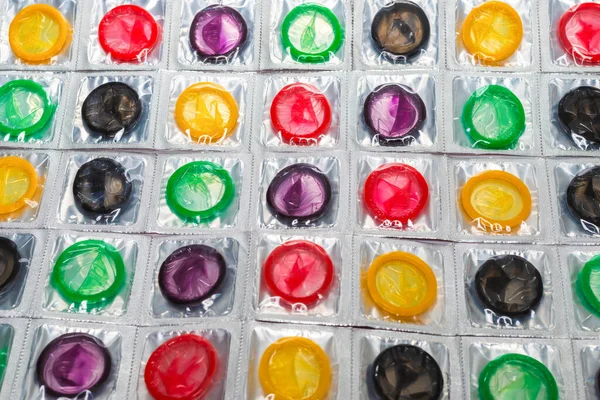 Colorful Condoms Background Top View — Stock Photo, Image