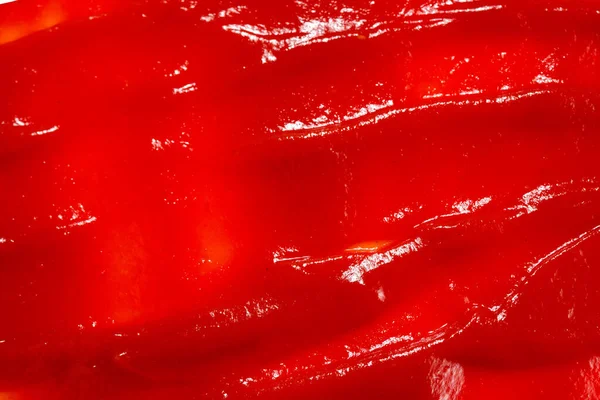 Kırmızı sos arka plan olarak sıçrar.