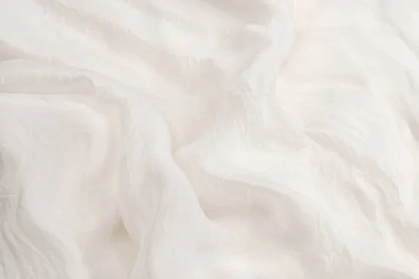 柔らかい滑らかな白い絹の生地の背景 生地の質感 — ストック写真