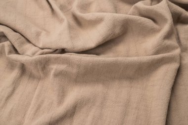 Pamuk bej kumaş desenli. Üst görünüm. 