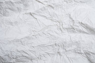 Buruşmuş beyaz kağıt arka plan. Üst görünüm. 