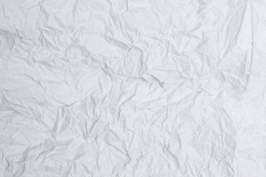 Buruşmuş beyaz kağıt arka plan. Üst görünüm. 
