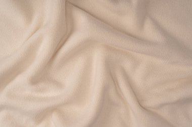 Arka plan olarak yumuşak sütlü merino yün süveter dokusu. Üst görünüm. 