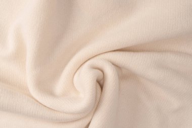 Arka plan olarak yumuşak sütlü merino yün süveter dokusu. Üst görünüm. 