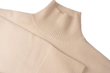 Beyaz arka planda yumuşak sütlü merino yün süveter. Üst görünüm.