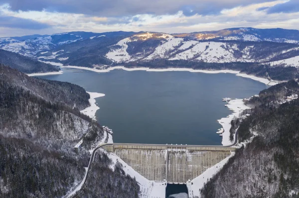 Energy dam and road, aerial winter scene — Stock Photo, Image