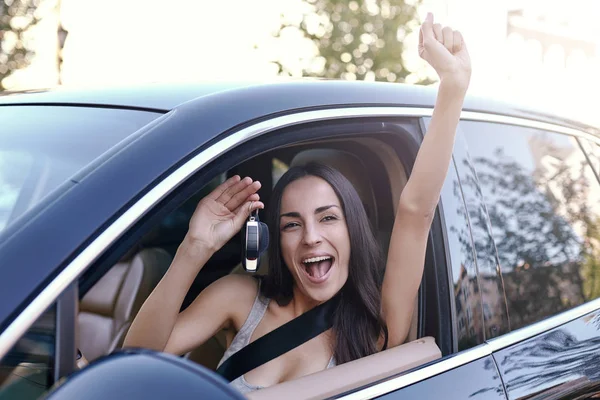 Portrait Happy Brunette Woman Holding Keys Sitting New Car — Stockfoto