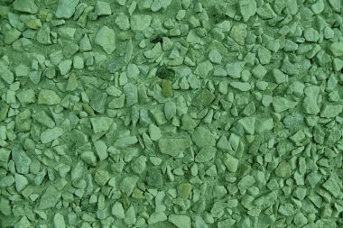 Ultra yeşil çakıl dokulu yüzey, taş zemin ve kaya arka plan