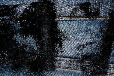 Eskimiş mavi kot pantolonların Grunge kirli kapanışı Denim dokusu, web sitesi veya mobil aygıtlar için makro arkaplan