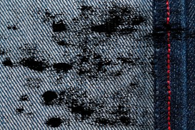 Kirli Denim doku kot arka plan için kırmızı dikiş ile