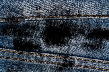 Eskimiş mavi kot pantolonların Grunge kirli kapanışı Denim dokusu, web sitesi veya mobil aygıtlar için makro arkaplan