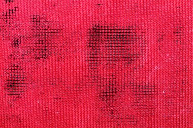 Doku veya arka plan grunge kumaş kırmızı boyalı.