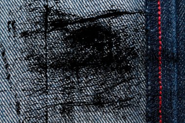 Kirli Denim doku kot arka plan için kırmızı dikiş ile