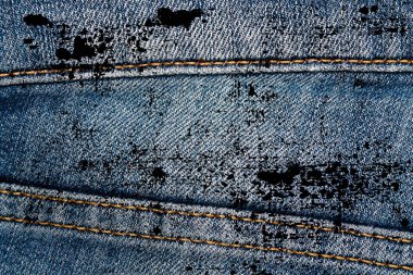 Eskimiş mavi kot pantolonların Grunge kirli kapanışı Denim dokusu, web sitesi veya mobil aygıtlar için makro arkaplan