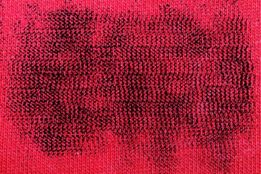 Doku veya arka plan grunge kumaş kırmızı boyalı.