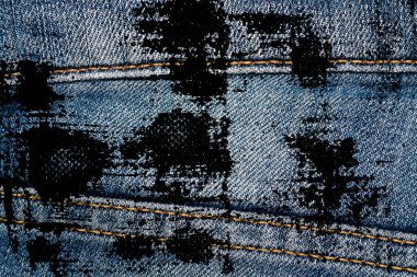 Eskimiş mavi kot pantolonların Grunge kirli kapanışı Denim dokusu, web sitesi veya mobil aygıtlar için makro arkaplan