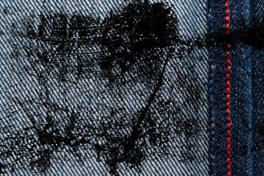 Kirli Denim doku kot arka plan için kırmızı dikiş ile