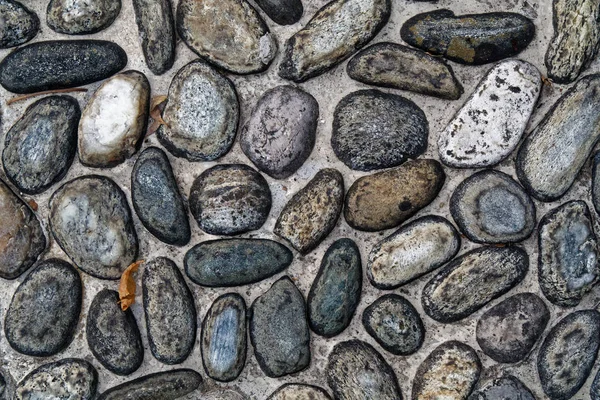 Seixos piso antigo fundo, closeup grandes pedras . — Fotografia de Stock