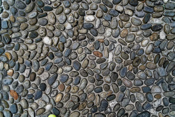 Ciottoli fondo pavimento antico, primo piano grandi pietre . — Foto Stock