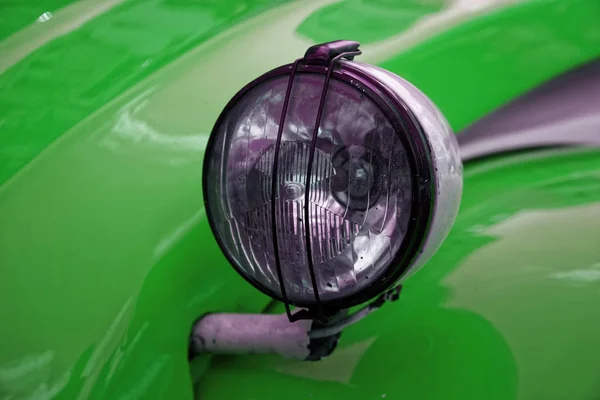 Headlamp of green vintage car, business concept. — Stock Photo, Image