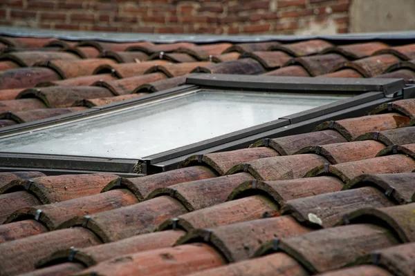 Roof tileswith window , medieval old roof tile, HDR shot from. — Stock Photo, Image