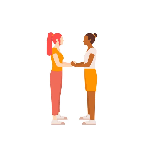 Dos lesbianas se enfrentan y se toman de la mano. Ilustración vectorial para tarjetas de felicitación en estilo plano. — Archivo Imágenes Vectoriales