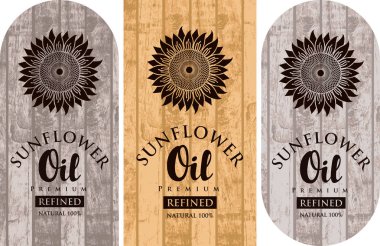 Rafine ayçiçek yağı ayçiçeği ve ahşap arka plan üzerinde yazıtlar için üç vektör etiket ayarla