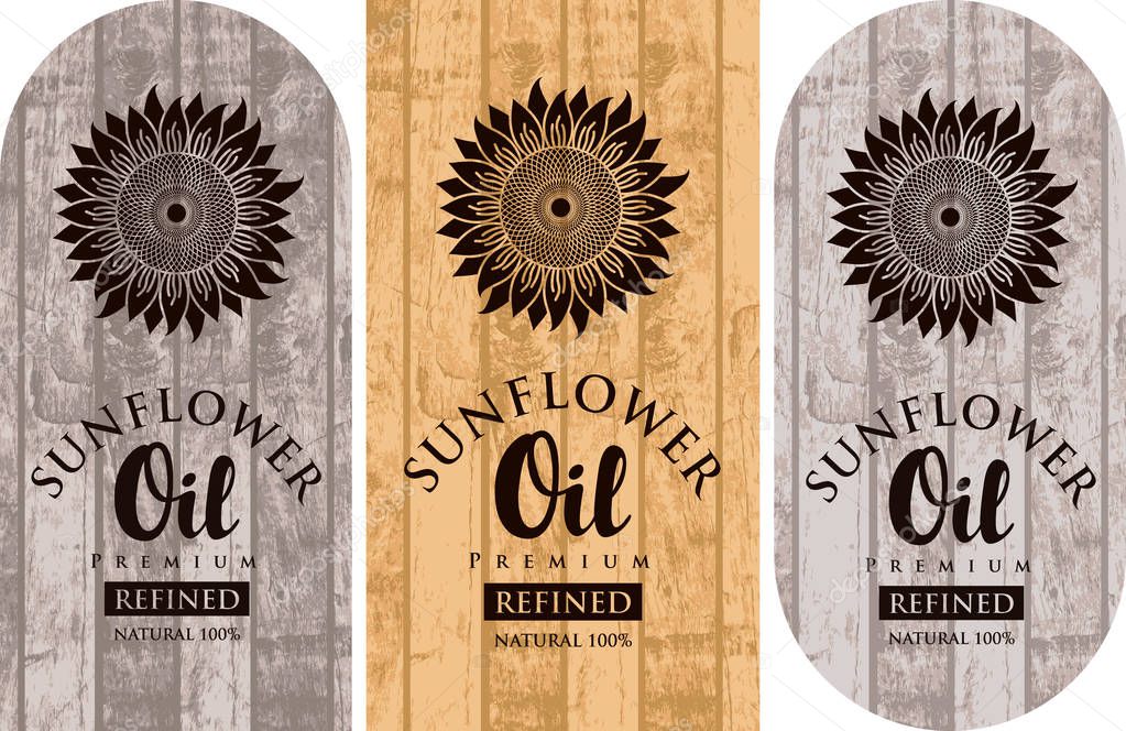 Set of three vector labels for refined sunflower oil with sunflowers and inscriptions on wooden background