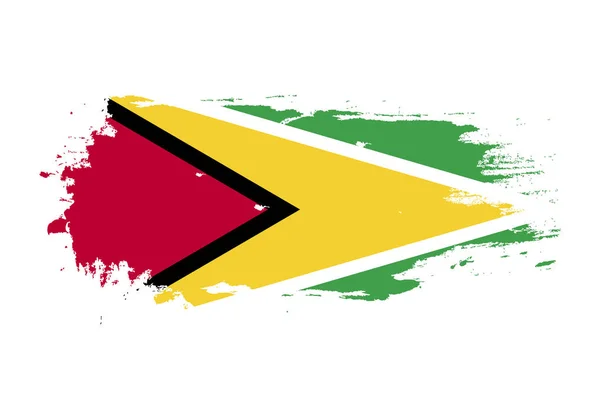 Grunge penseelstreek met Guyana nationale vlag. Aquarel bezit — Stockvector