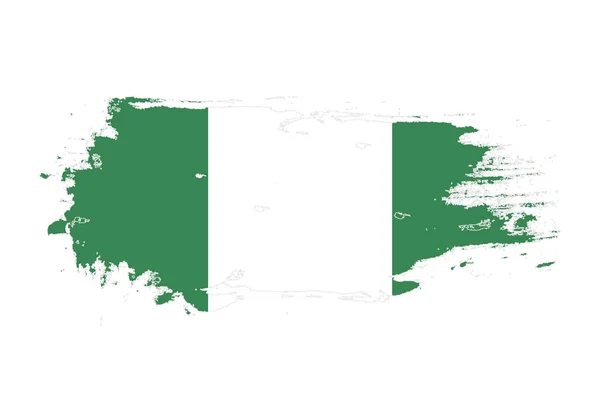 Grunge penseldrag med Nigeria flagga. Akvarellfärg — Stock vektor